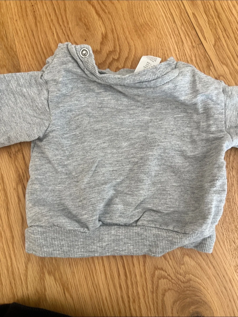 Carter's and H&M Neutral Newborn Baby Bundle—onesie, sweat set, baby gloves